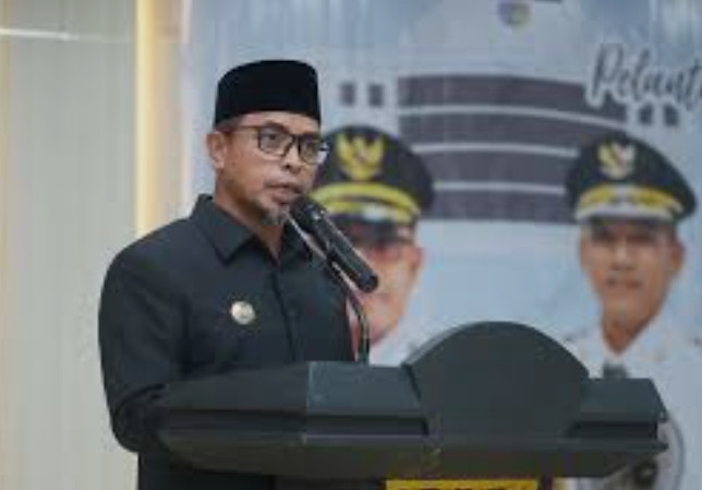 Rompi Oranye Sirajudin Lasena: Tanda Tanya Besar atas Integritas Pimpinan Bolmong Utara di Tengah OTT KPK